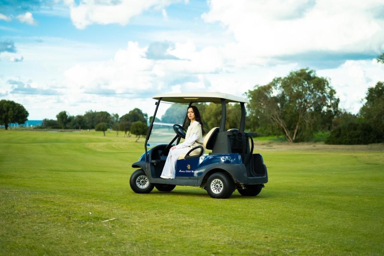 The View Bouznika Hotel Exterior foto Golf cart